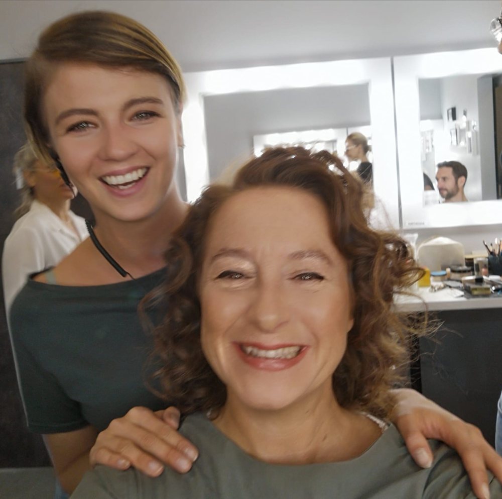 Marta backstage with an actress before a shoot